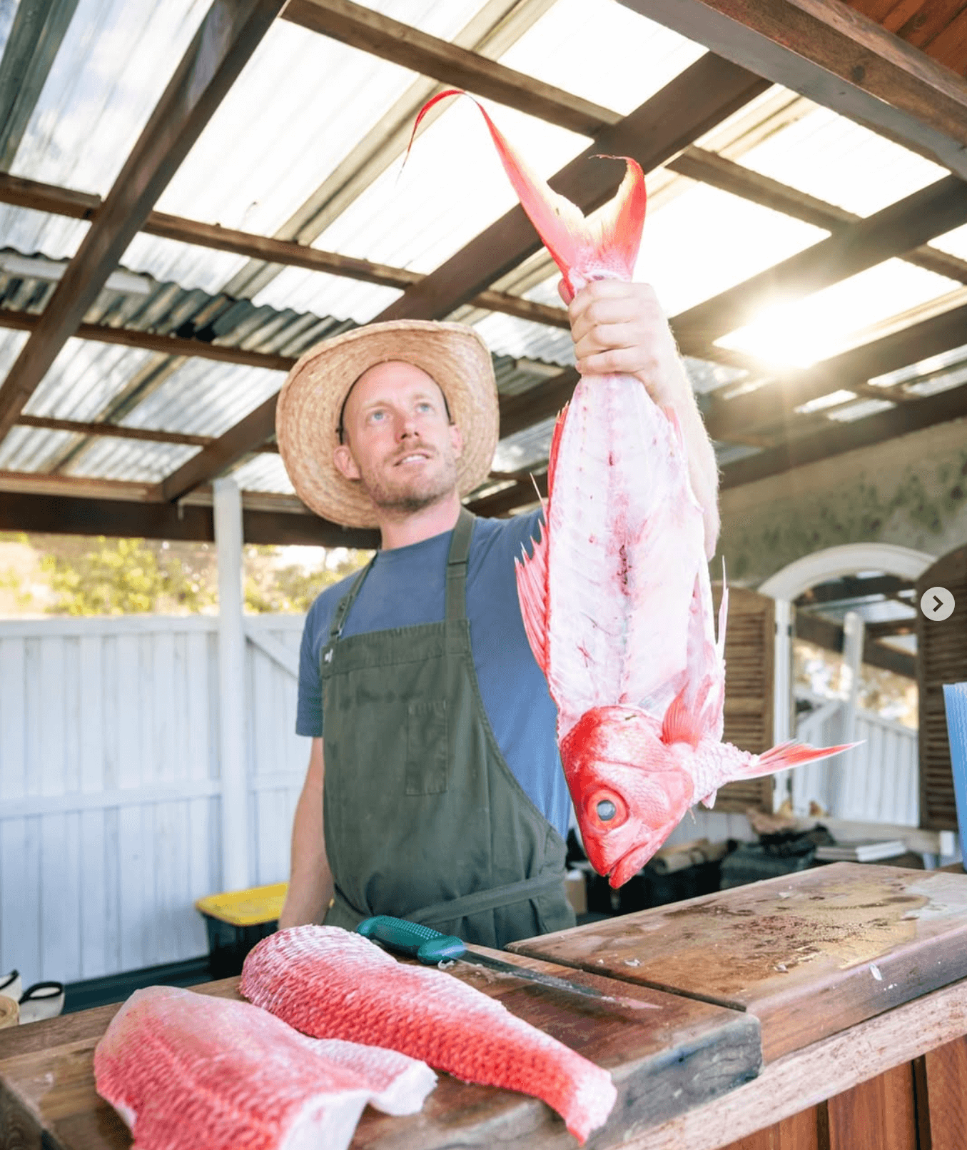 Wal Foster Chef with Fish Chef Wal Foster holds up a fish